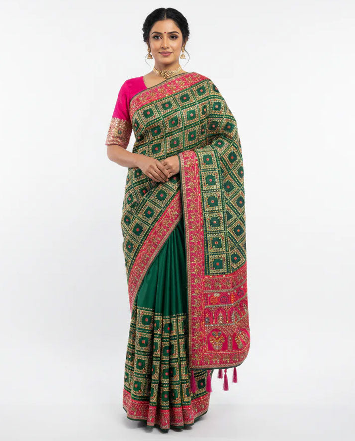 Elegant Green Silk Saree with Pink Contrast Border and Traditional Woven Design