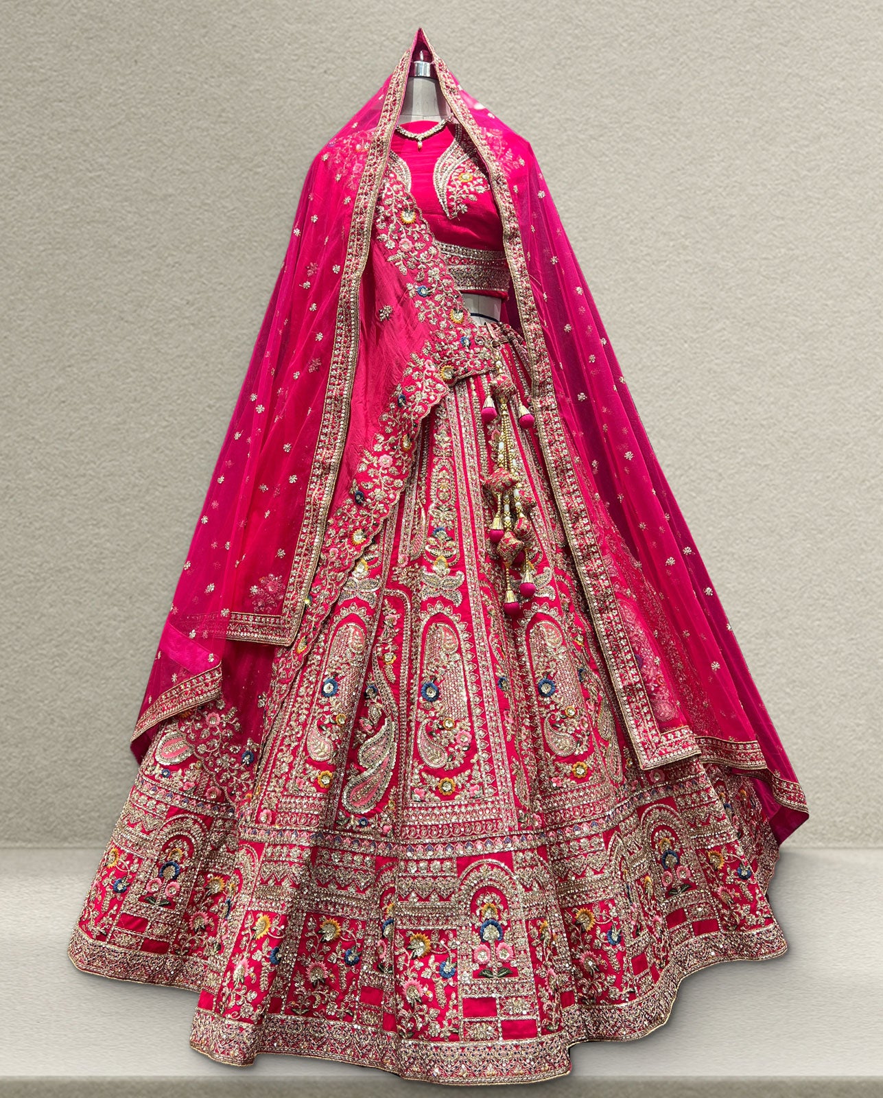 Rani Pink Bridal Lehenga Choli with Heavy Zardozi Embroidery and Designer Net Dupatta