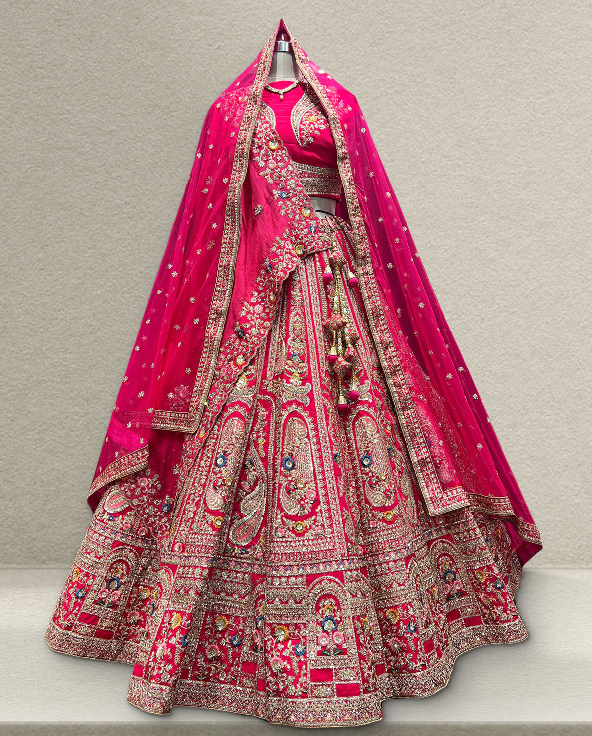Rani Pink Bridal Lehenga Choli with Heavy Zardozi Embroidery and Designer Net Dupatta