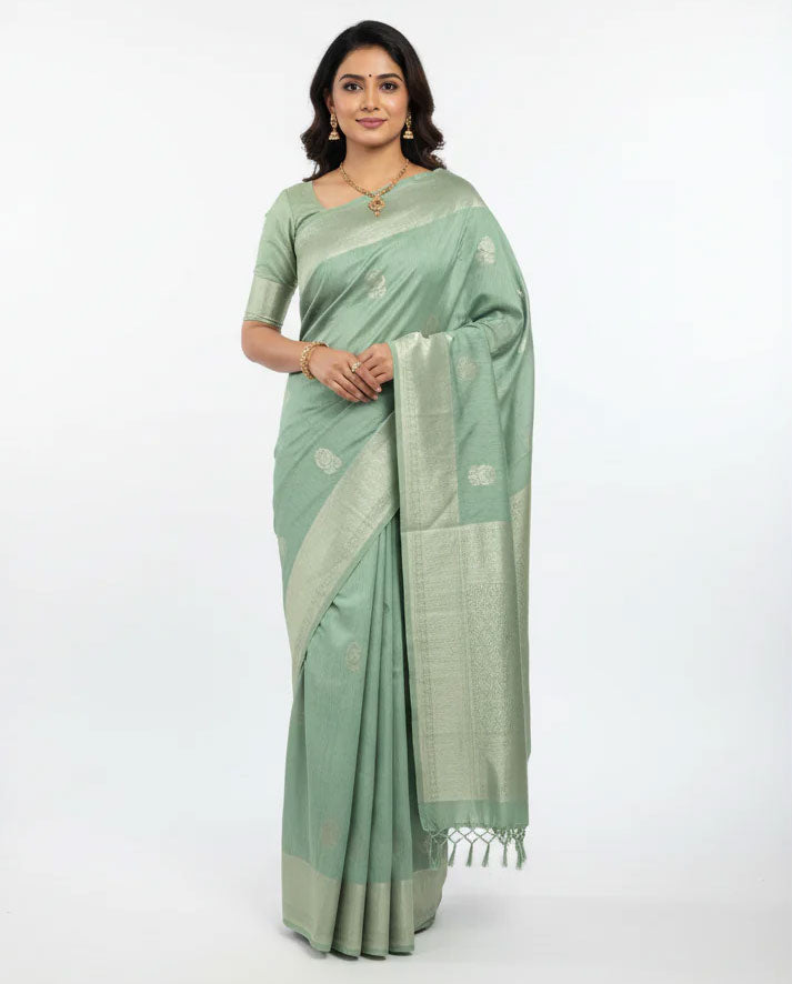 Elegant Pastel Green Silk Saree with Subtle Zari Motifs and Rich Woven Border