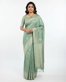 Elegant Pastel Green Silk Saree with Subtle Zari Motifs and Rich Woven Border