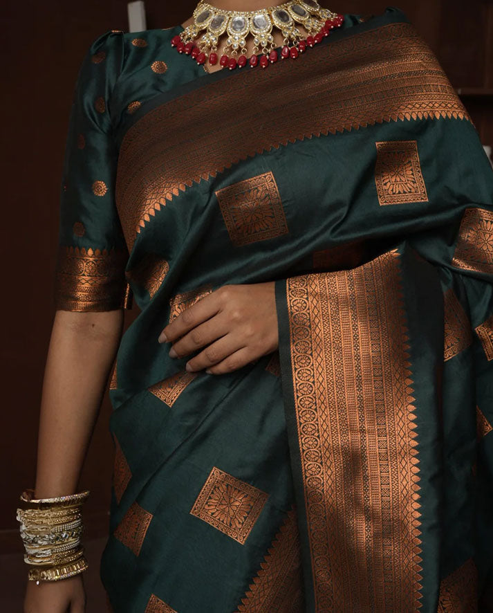 Elegant Dark Green Banarasi Silk Saree with Rich Copper Zari Motifs and Traditional Border