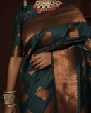 Elegant Dark Green Banarasi Silk Saree with Rich Copper Zari Motifs and Traditional Border