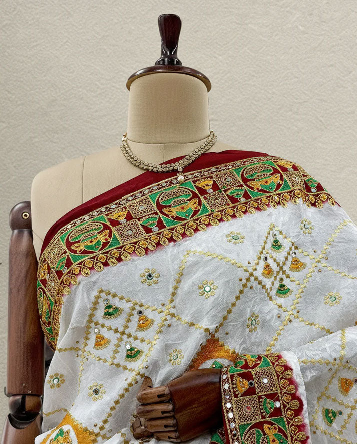 Graceful White Silk Saree with Multicolor Traditional Border and Rich Maroon Pallu