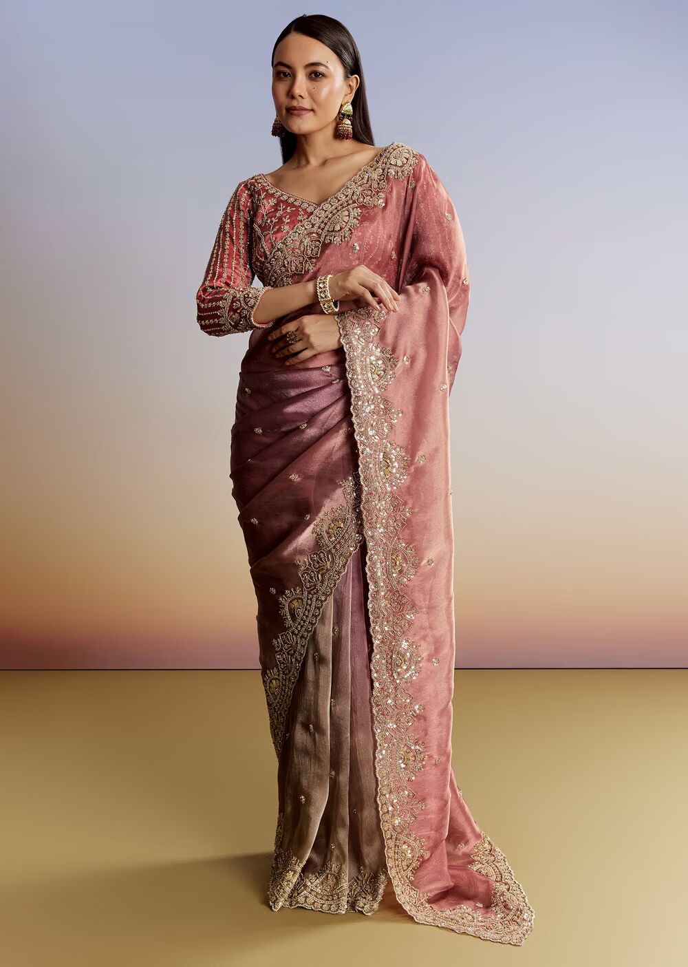 Peach Shaded Tissue Saree With Heavy Embroidered Blouse
