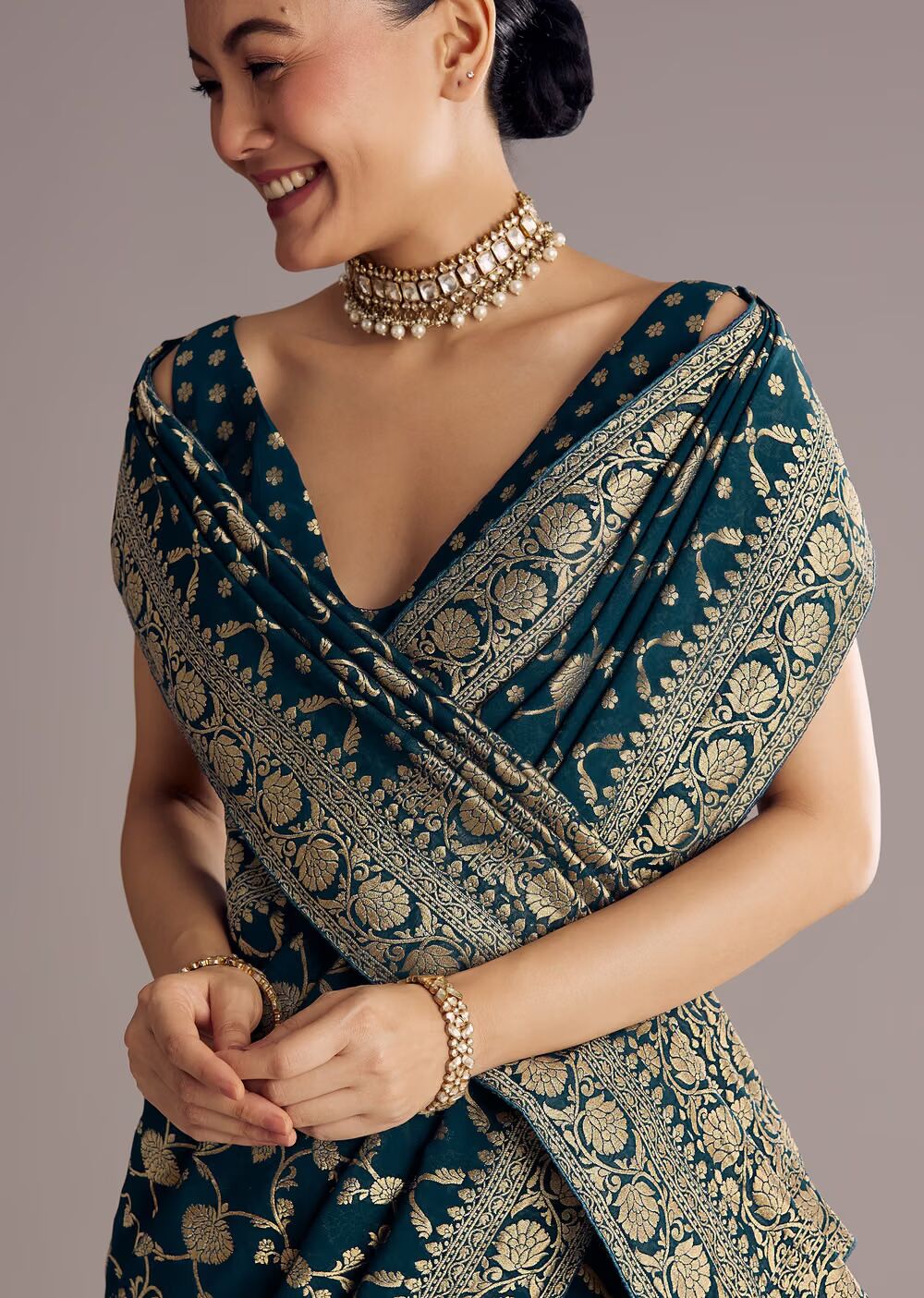Peacock Blue Georgette Woven Saree With Floral Border