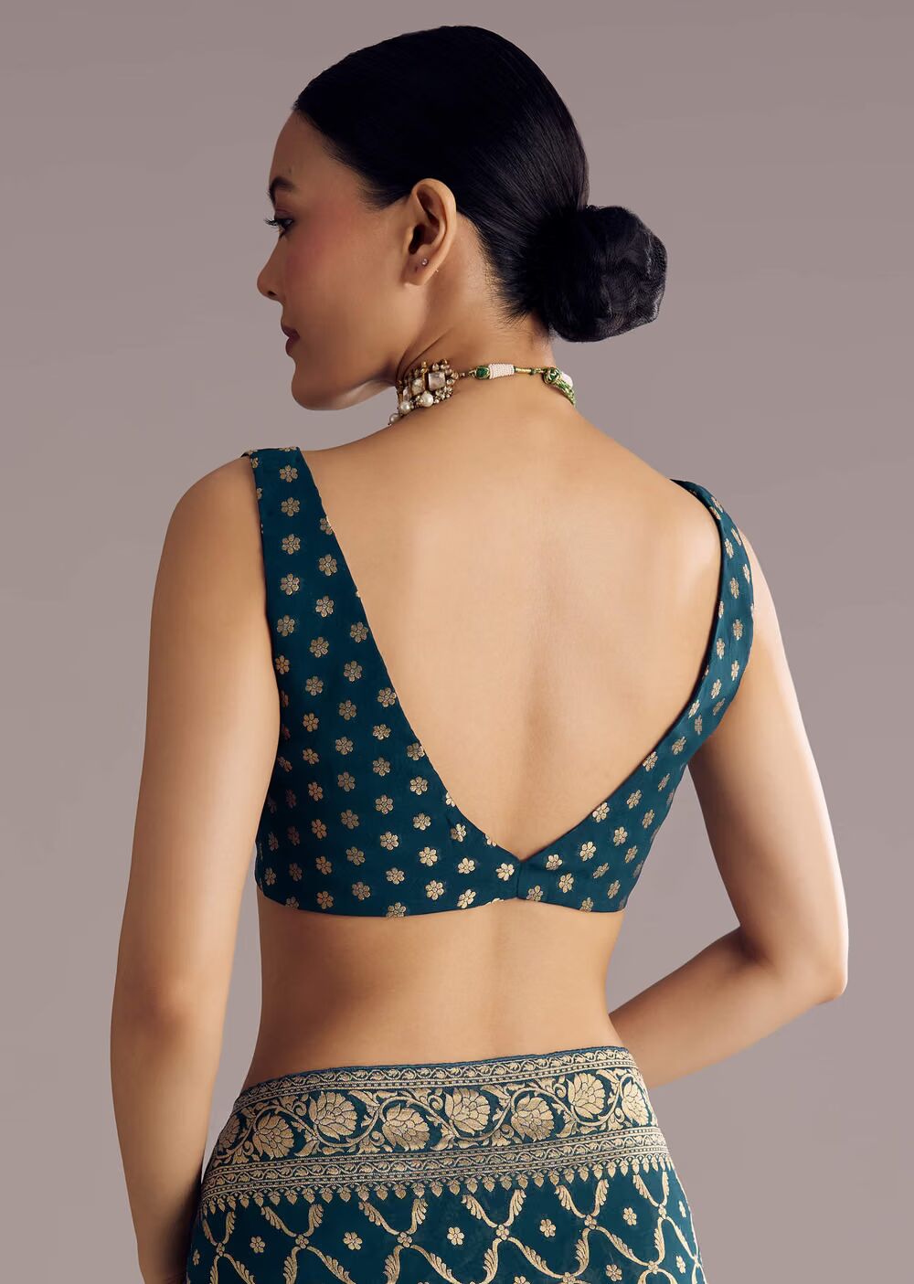 Peacock Blue Georgette Woven Saree With Floral Border